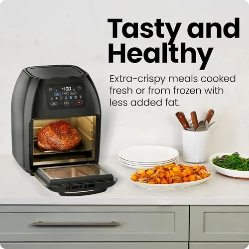 Rotisserie chicken cooking inside the Chefman Air Fryer+