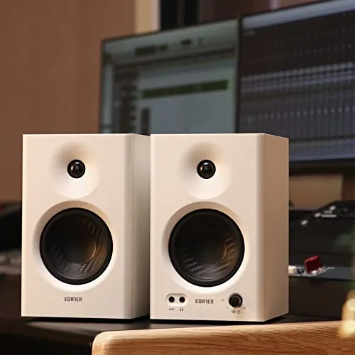The MR4 speakers in a typical desktop studio setup with a laptop