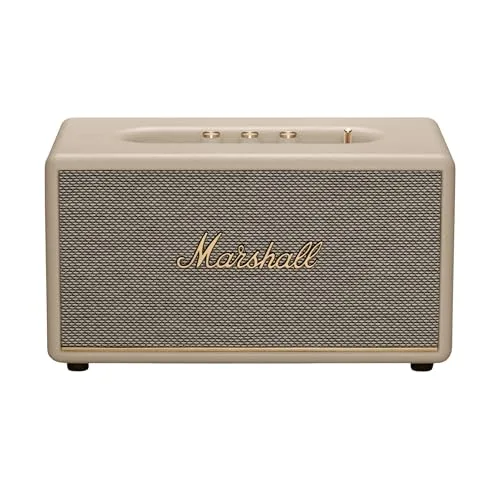 Front view of the Marshall Stanmore III in cream on a wooden table