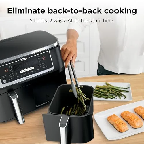 Ninja Foodi DualZone Air Fryer showing two baskets with different foods